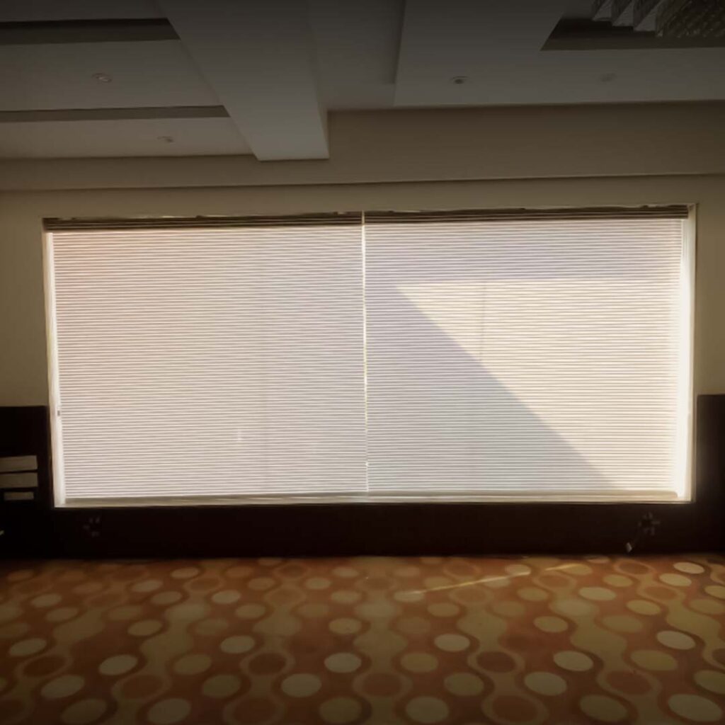 Completed sheer blinds installation in a guest room at Candolim Grand Inn, Goa