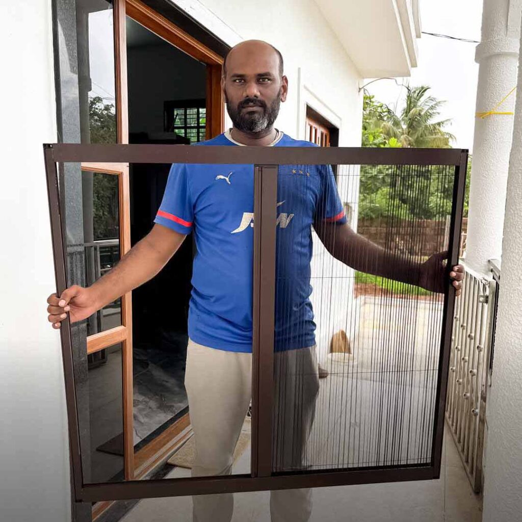Mosquito mesh window installation at Ribandar by Salman Azam, SN Interiors Goa