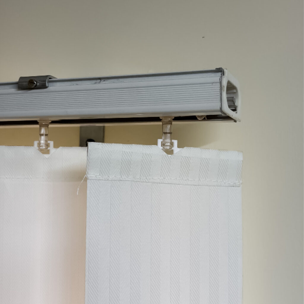 Vertical blinds installation at Goa State Co-operative Bank by S.N Interiors.