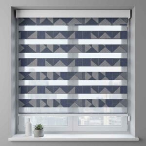 Alkemis Greta zebra blinds installed on a modern window in Goa with geometric patterned fabric offering light filtering and privacy