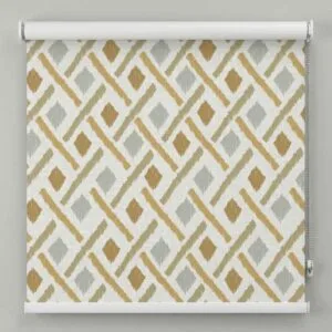 Alkemis Aura roller blinds AU022 with geometric ikat pattern in beige and mustard tones installed in Goa