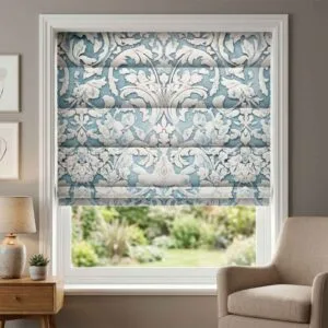 SN Interiors roman blinds PG03 with blue damask floral pattern installed in a modern living room in Goa