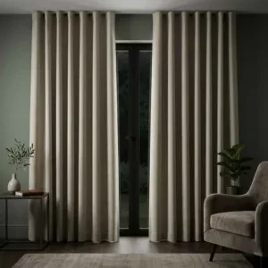 Premium slate-colored curtains from the Malta collection professionally installed by SN Interiors Goa.