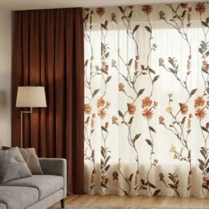 Premium rust-colored blackout curtains and embroidered vine sheers installed by SN Interiors Goa.